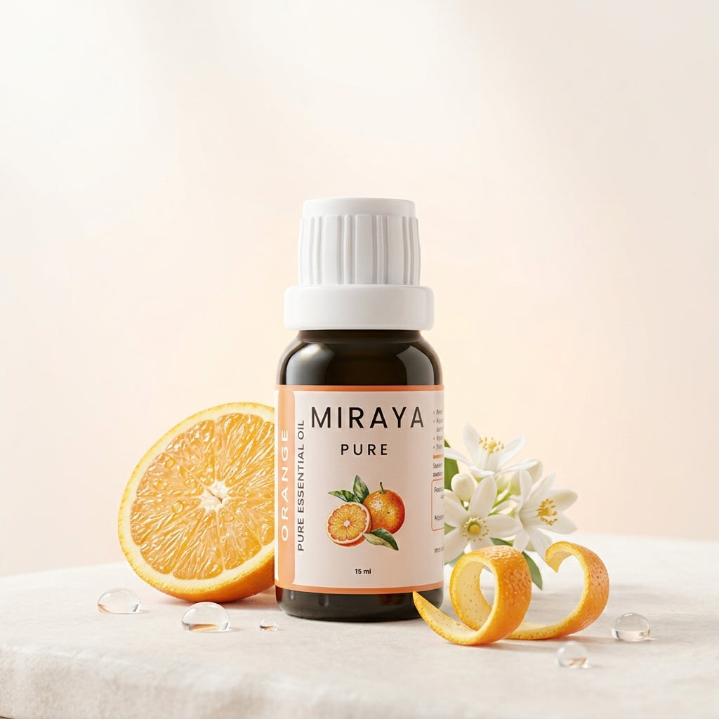 Miraya Pure essential oil bottle with oranges and flowers on a light background